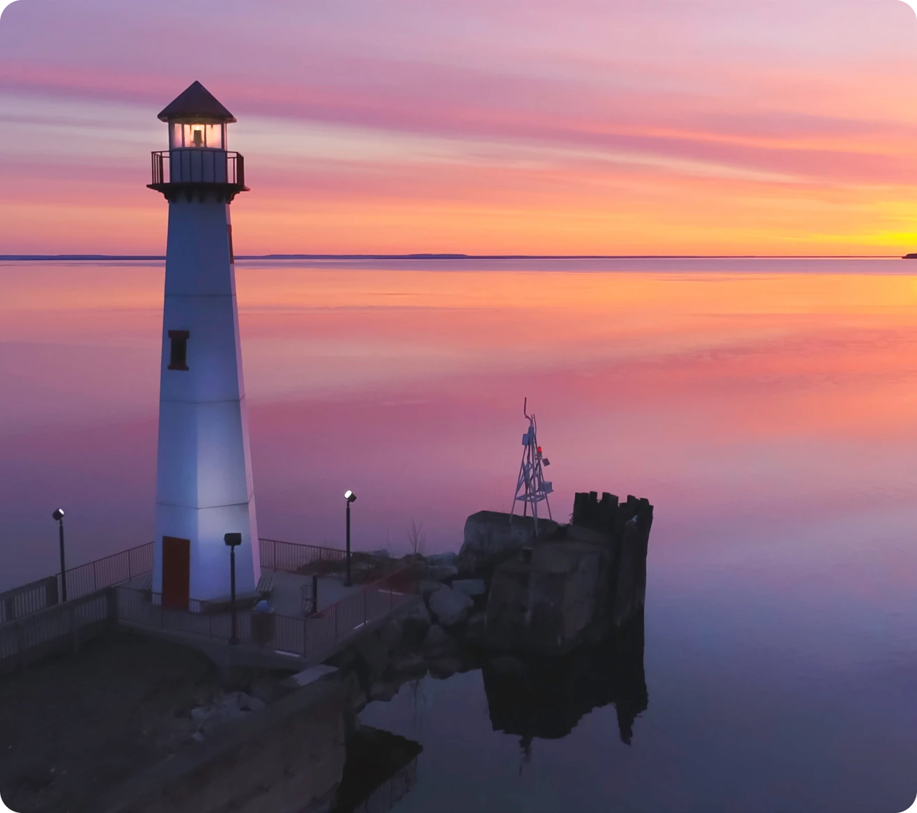 Serene ocean view with lighthouse