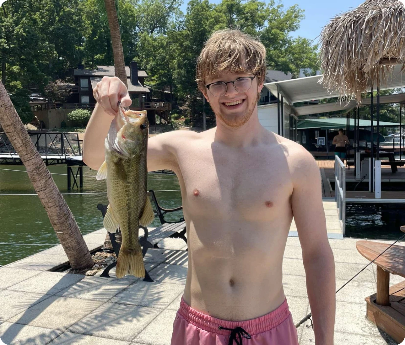 Smiling man displaying his catch